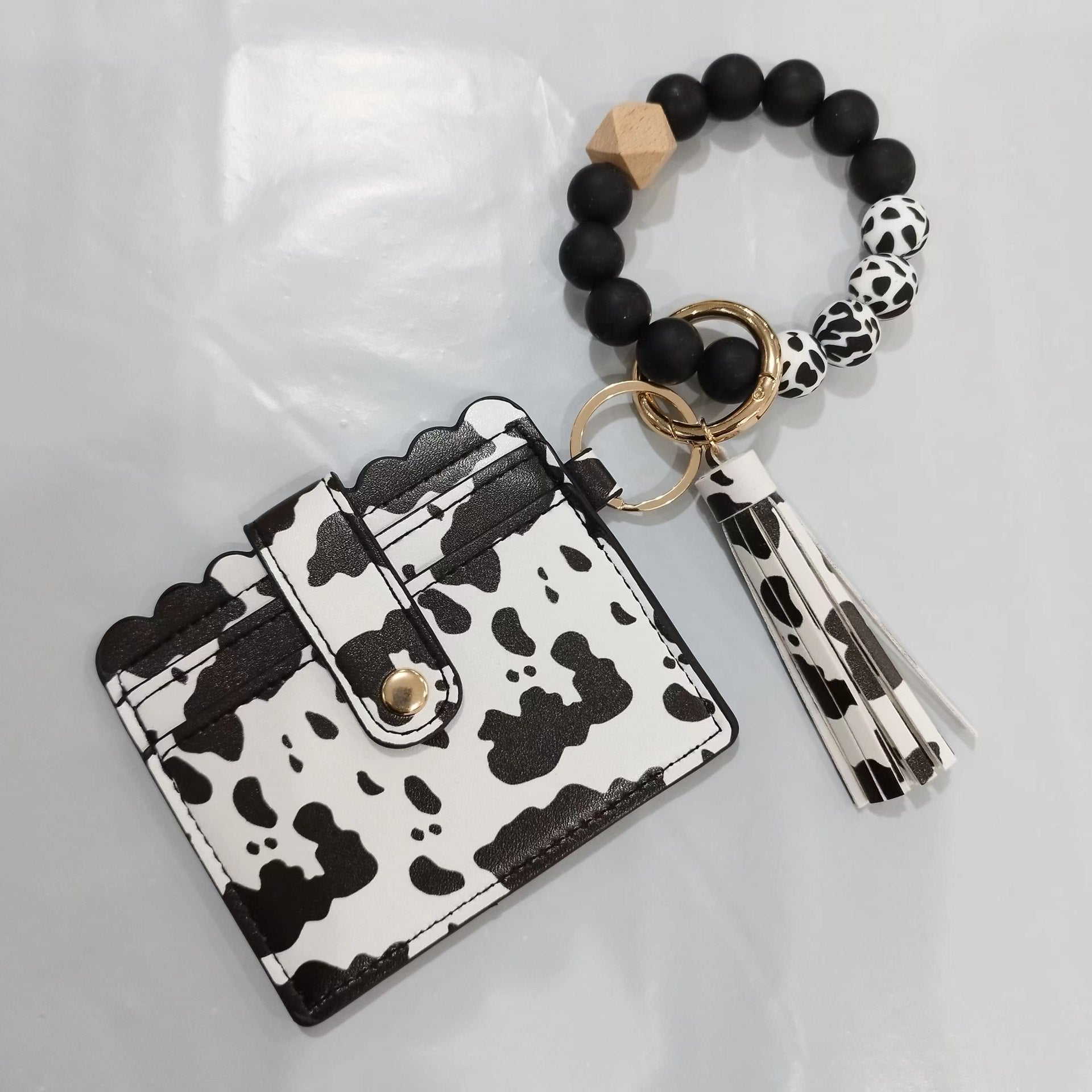 Venta al por mayor MAMA Cow Pattern Card Bag Silicona Beaded Wrist Key Chain